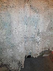 One of two antique crochet tatted bedspreads