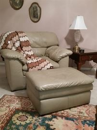 Gray leather chair and ottoman