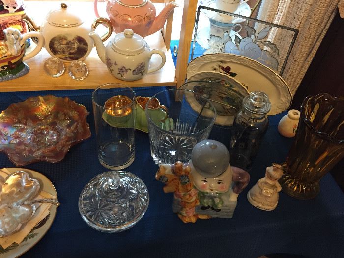 Assortment of elegant, depression, pressed, leaded, crystal and molded glass, tea pots, Carnival Glass, figurines, servingware and so much more!