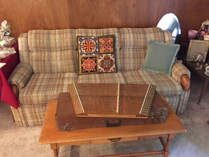 Lazy Boy Sofa Sleeper, loads of decorator pillows, coffee table and a wonderful craftsman-made hammer dulcimer with case.  Excellent condition.
