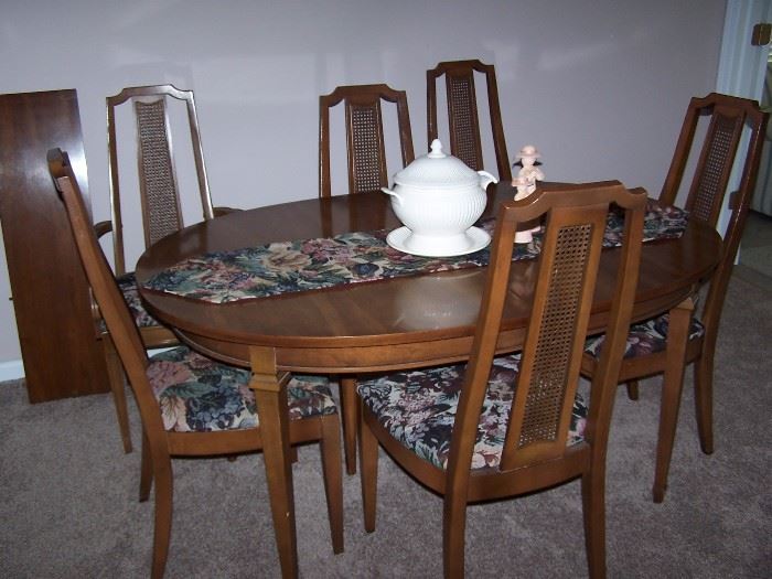 wood table with 6 chairs and 3 leaves