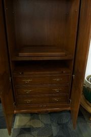 A country French armoire hand carved walnut solids, knotty white oak door and end panel veneers, carved crown and carved base.  By Karges Furniture Co.  (Appraised: $7,500).  For Sale: $1,900