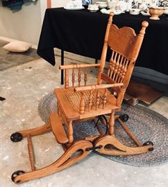 PICTURE 2: Antique High Chair & Stroller Combo. This item, estimated to be from the late 1800s or early 1900s, is mostly made of oak, with steel wheels and hardware. $100