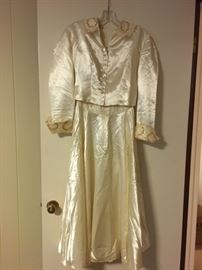 Vintage 1950s satin and lace wedding dress. Strapless lace bodice. Available