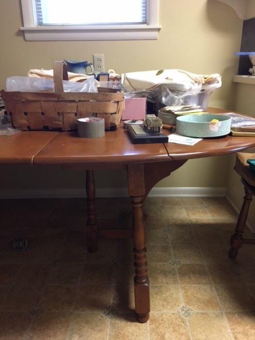 Heywood Wakefield drop leaf table with 3 leaves. Available