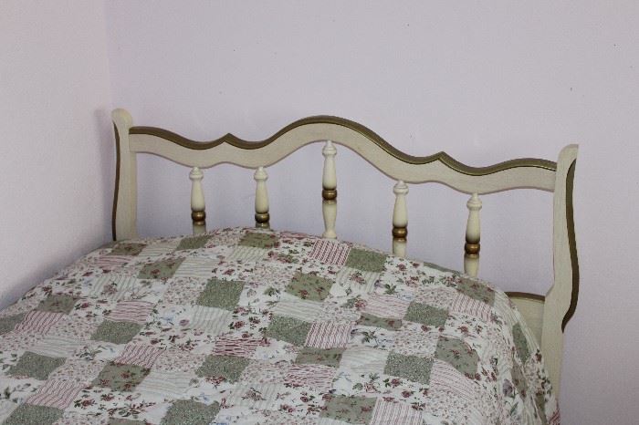 pair of white twin bed frames with gold colored accents