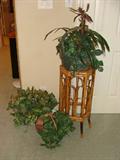 Wood plant stand with silk plants.
