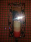 Sconce with candle.