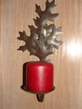 Sconce with candle.