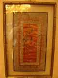 Framed Asian tapestry.