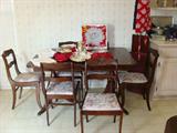 Antique Drexel Furniture Co. dining table with 6 chairs.