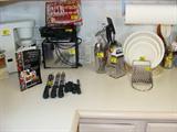 Knives, bowls and other kitchenware.