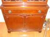 Antique wood china cabinet.