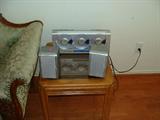 Stereo and glass top end table.