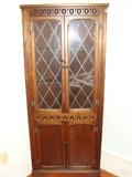 Antique corner display cabinet.