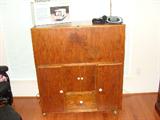 Wood rolling desk/storage cabinet.