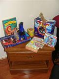 Wood end table with games.