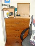 Wood dresser with GPS equipment.
