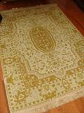 Gold area rug.