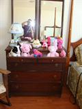 Antique wood dresser with double mirrors.