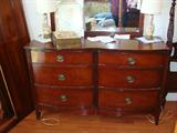 Antique wood dresser with mirror.