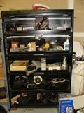 Metal storage with tools.