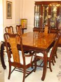 Q.C. rosewood with burled top dining table with 8 chairs. (Made in Taiwan)