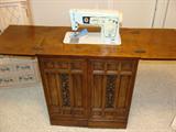 Sewing cabinet with Singer Special Zigzag sewing machine (Model 478)