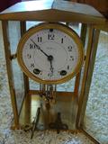 Seth Thomas clock with original pendulum and crystal regulator.