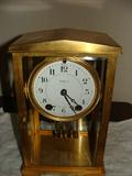 Seth Thomas clock with original pendulum and crystal regulator.