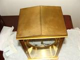 Seth Thomas clock with original pendulum and crystal regulator.