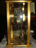 Seth Thomas clock with original pendulum and crystal regulator.