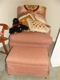 Pink upholstered arm chair with Leg Lounger ottoman.
