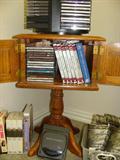 Wood lamp table with cd's.