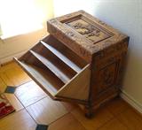 Hand carved magazine rack