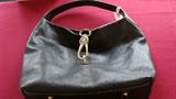Black leather Dooney & Bourke purse