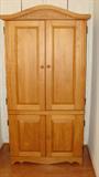 Light pine TV armoire