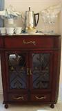 • Glass paneled clock cabinet
• Glass paneled server