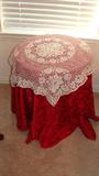 Round side table with lace and table cloth