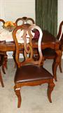 Markor International Furniture dining table with 6 chairs & a leaf