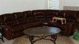 Leather chocolate brown 4-piece sectional sofa w/ 2 rocking recliners, single seat, & corner seat