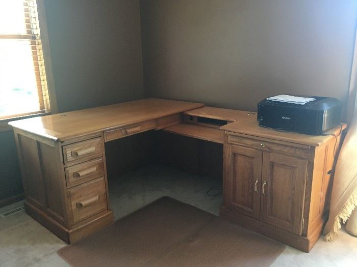 Corner oak desk with file cabinet.  Perfect for home office or new business