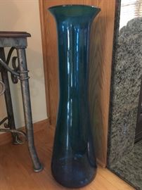 Tall blue glass vase
