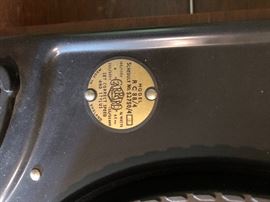 Label on vintage turntable, Carrard; Made in England
