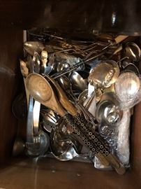 Large collection of serving utensils 