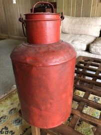 Vintage milk can, probably 2-3 gallons, painted orange