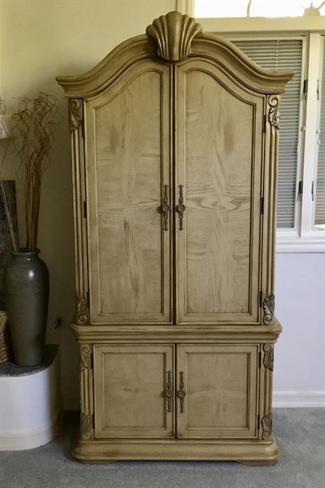 This armoire is very spacious.  Can be used for clothing or for a TV