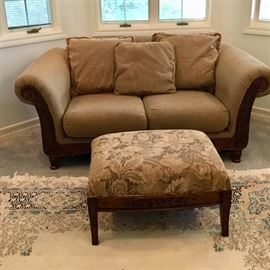 Two person loveseat and a neutral ottoman - matches larger sofa