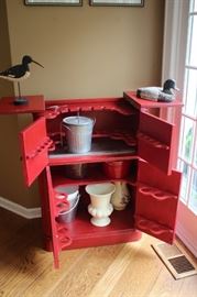 Storage Cabinet in Red, Assorted Vases and Pails with Bird Statuary and Duck Decoy