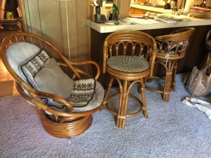 2 Wicker swivel stools, solid high end. chair and one stool has been sold